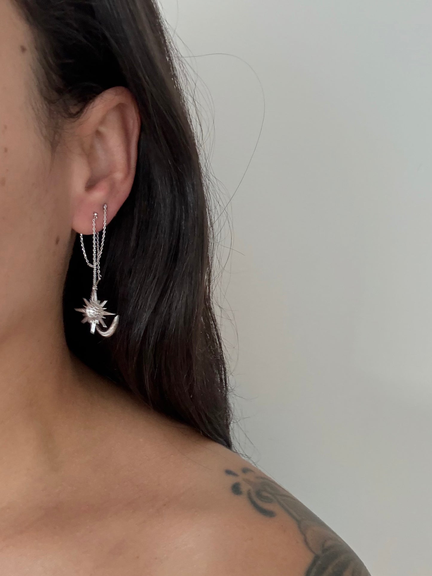 Noir NYC Star & Moon double swinger earrings