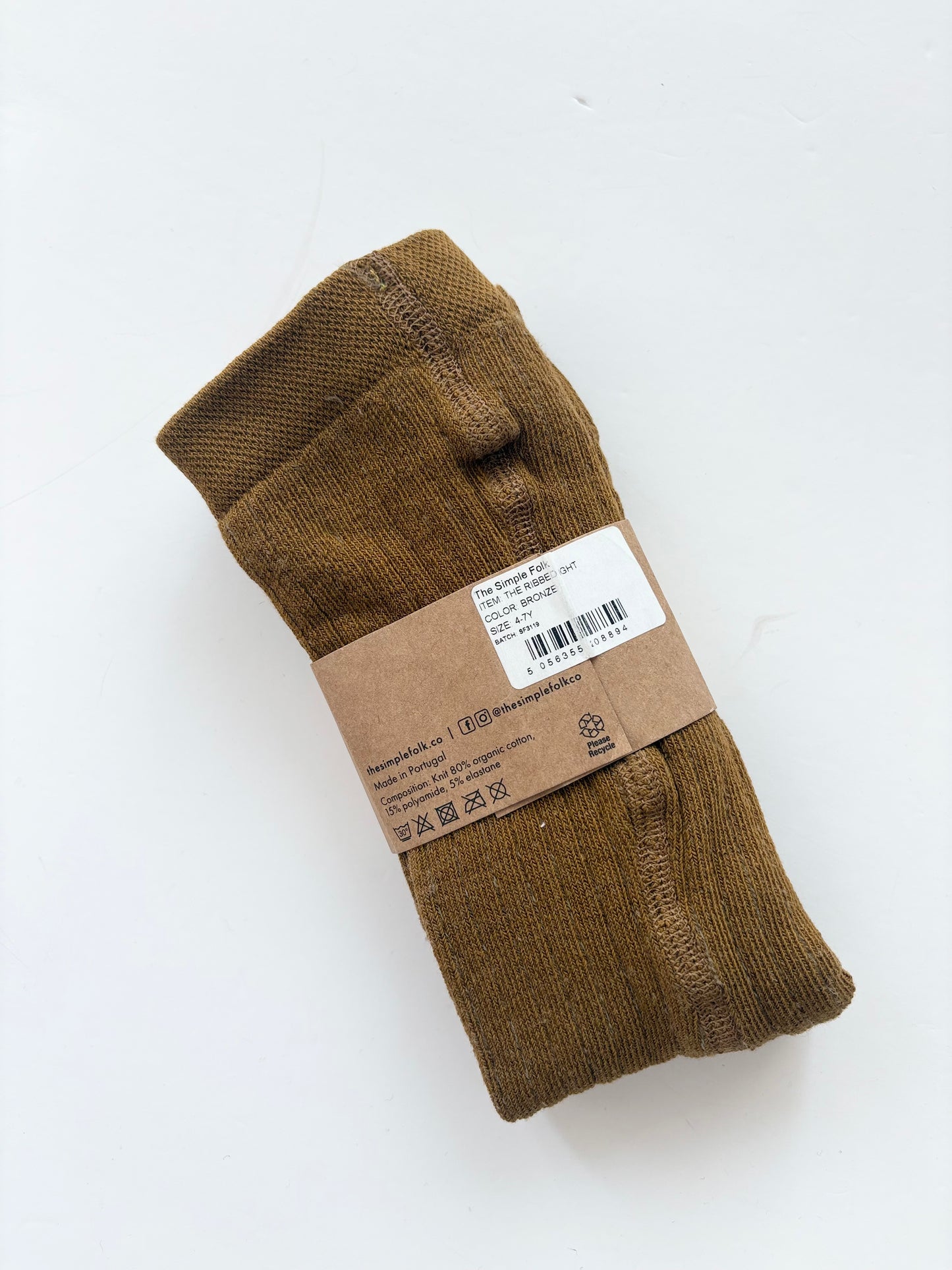 The simple folk ribbed tights in bronze 4/7Y