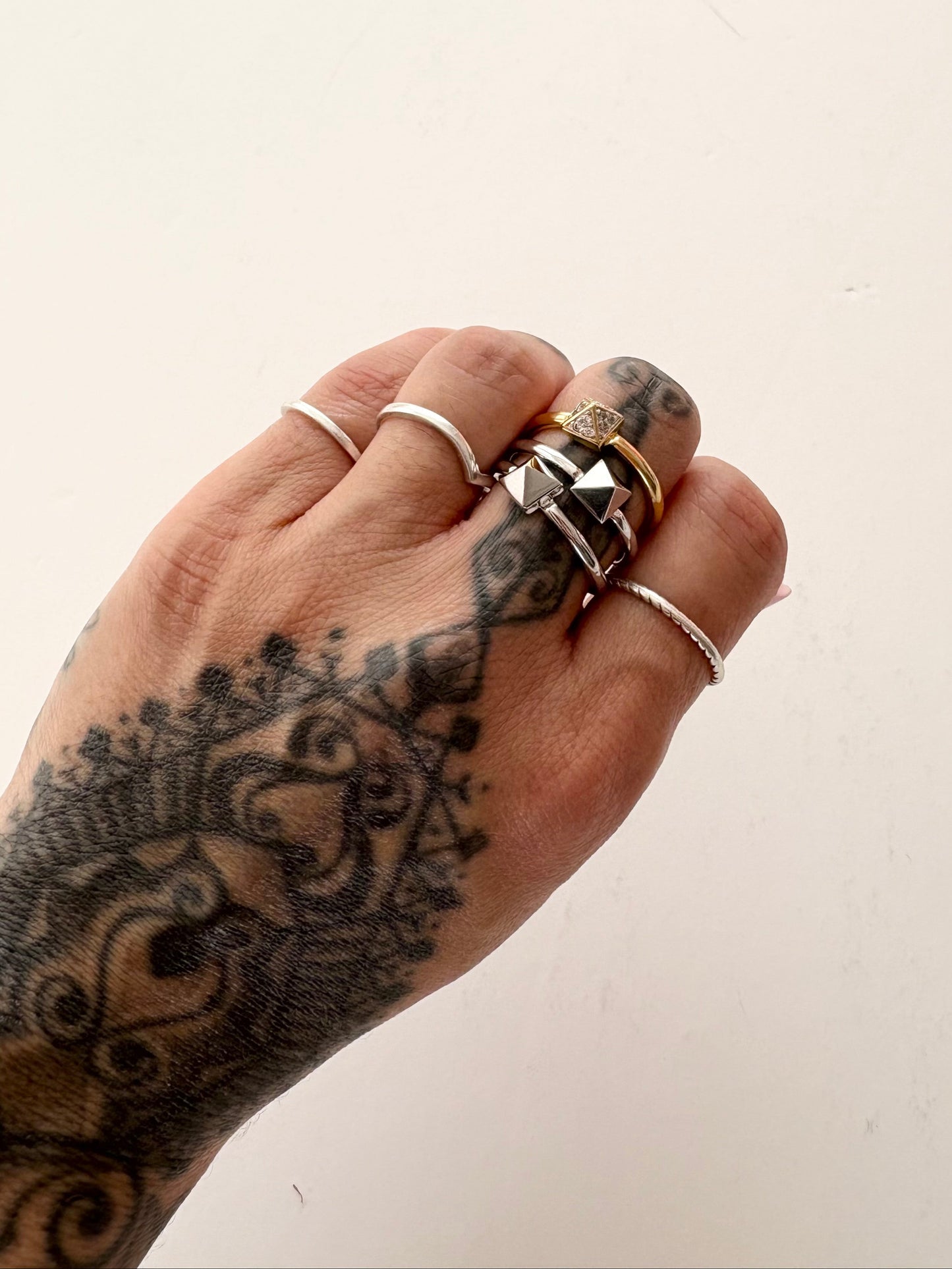 Noir NYC gold & silver pyramid ring stack