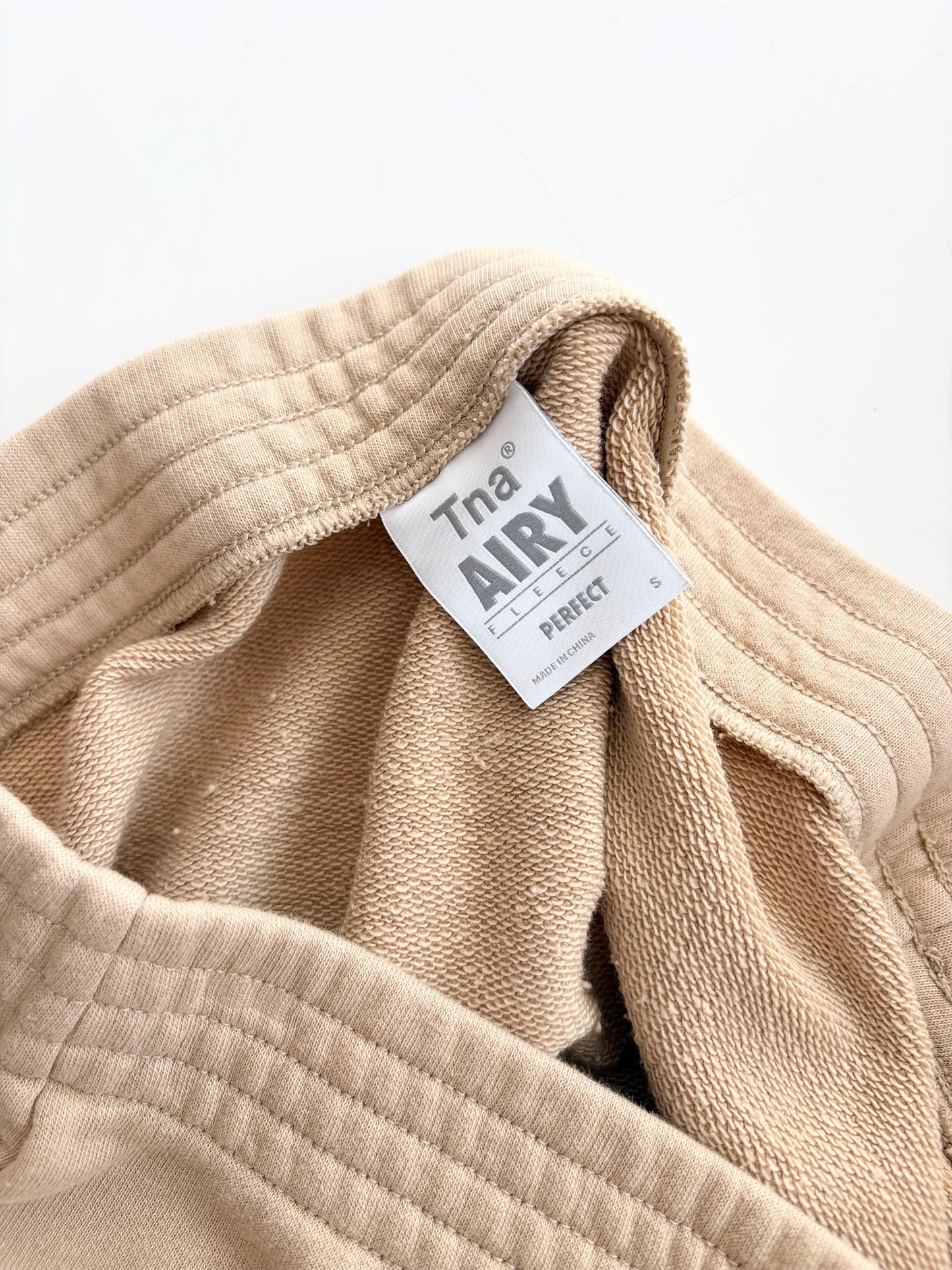 Aritzia TNA mini jupe perfect airy fleece Small