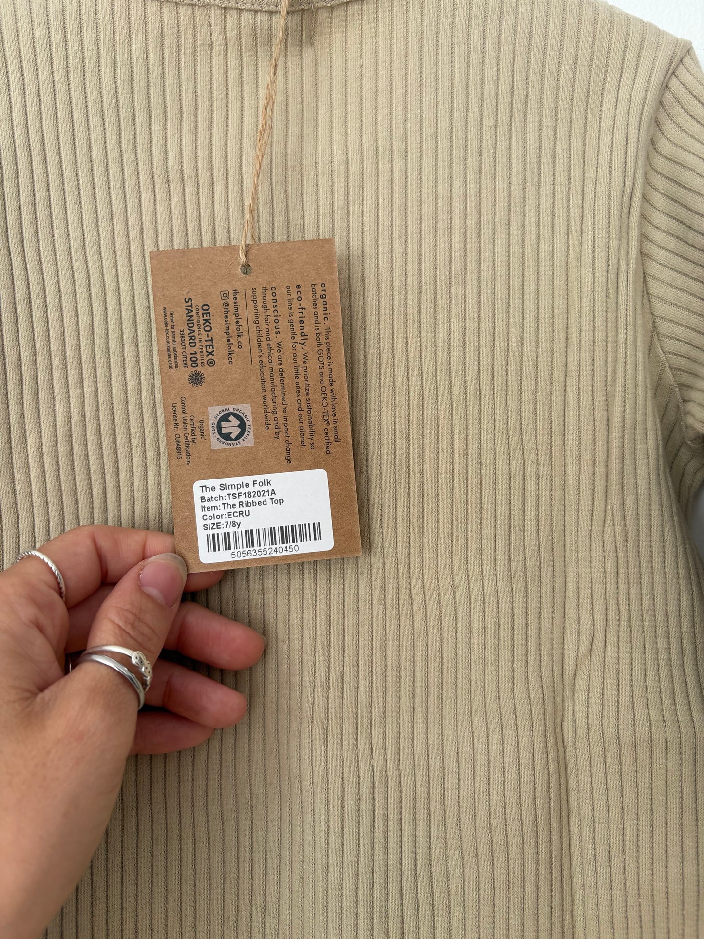 The simple folk ribbed top in ecru 7/8Y