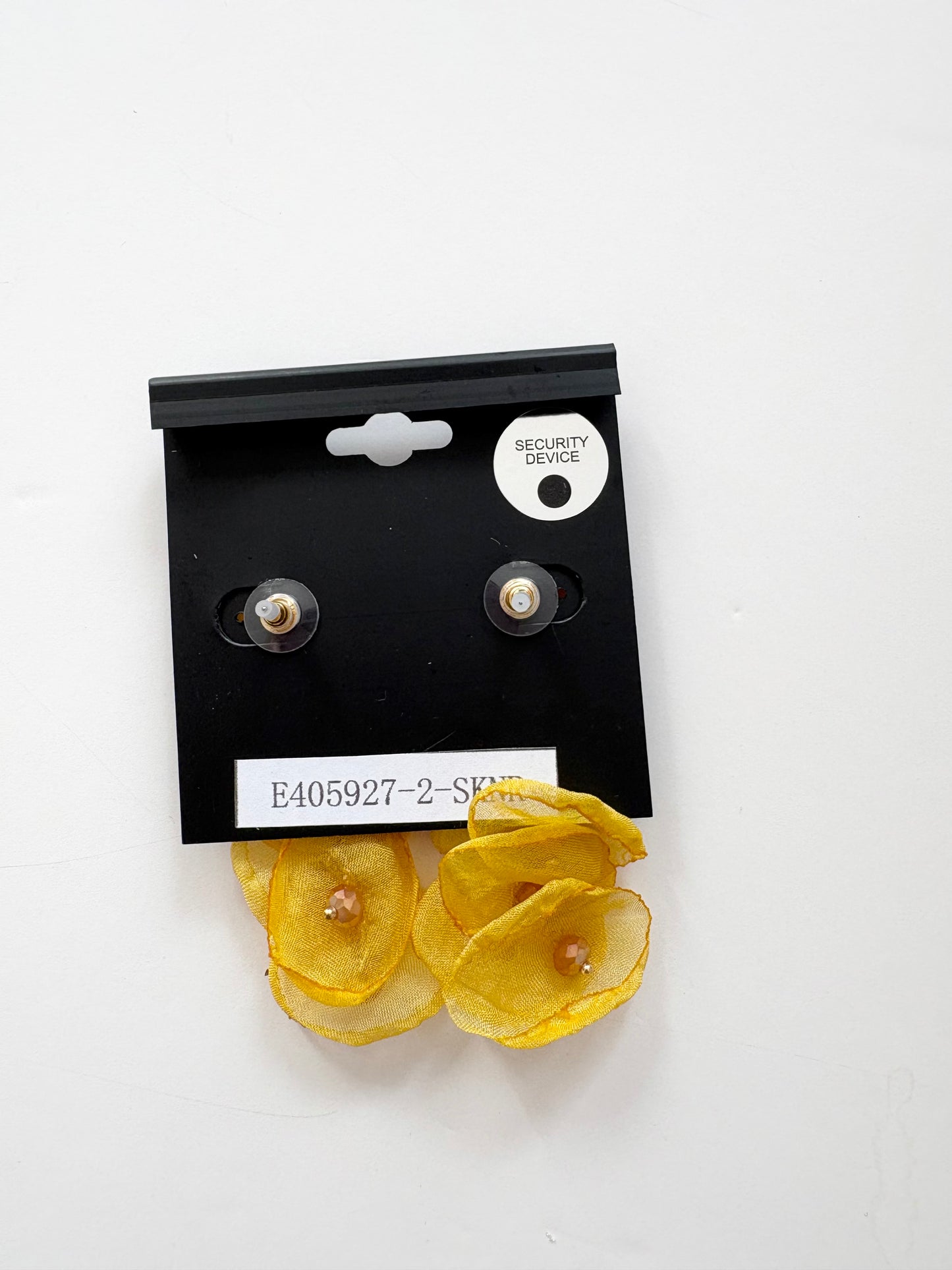 Noir NYC yellow floral pendant earrings