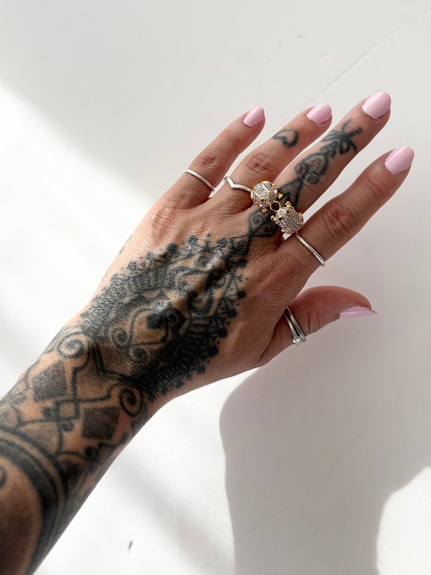 Noir NYC gold plated kissing frog ring