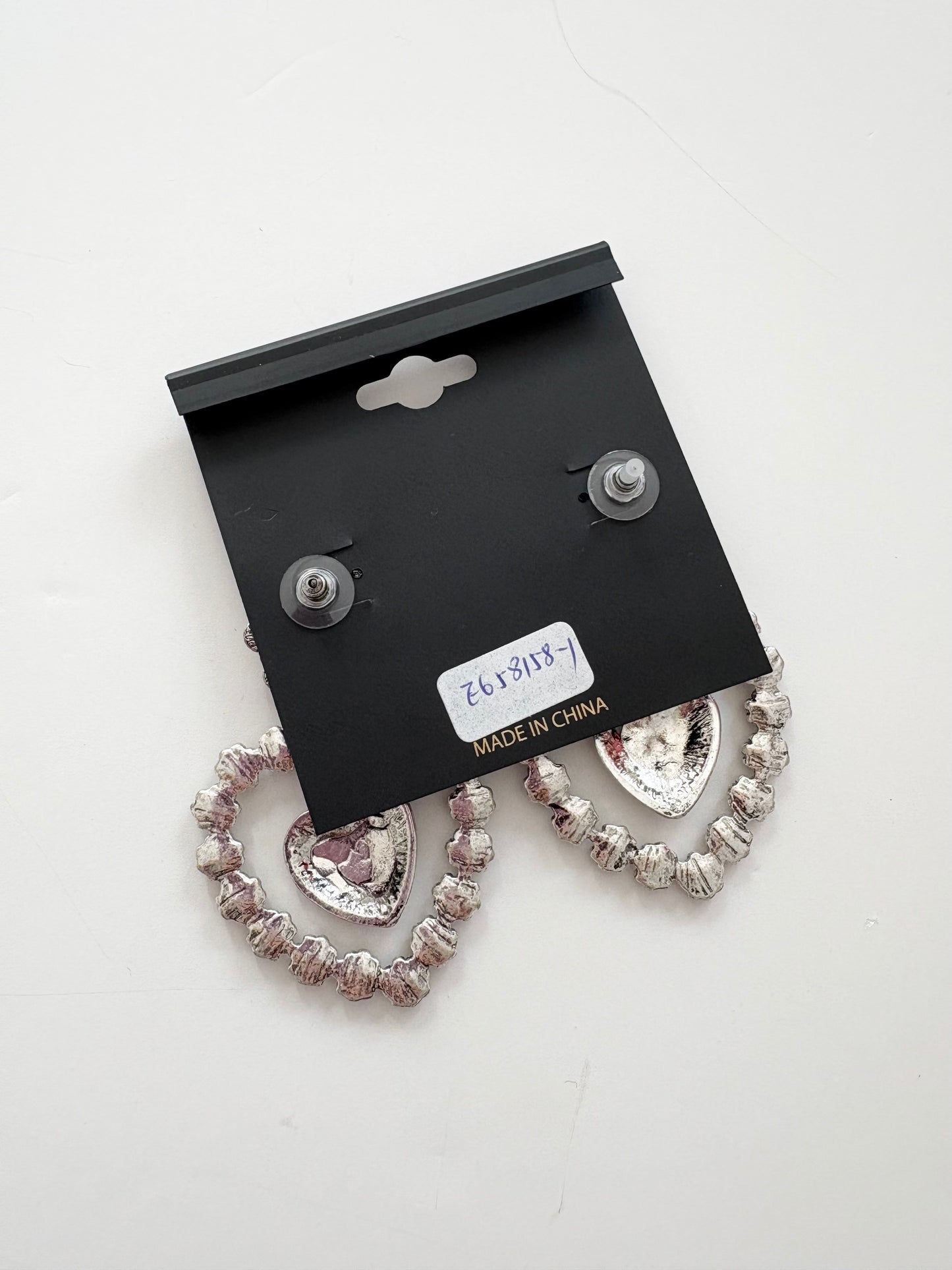 Noir NYC silver flower heart earrings