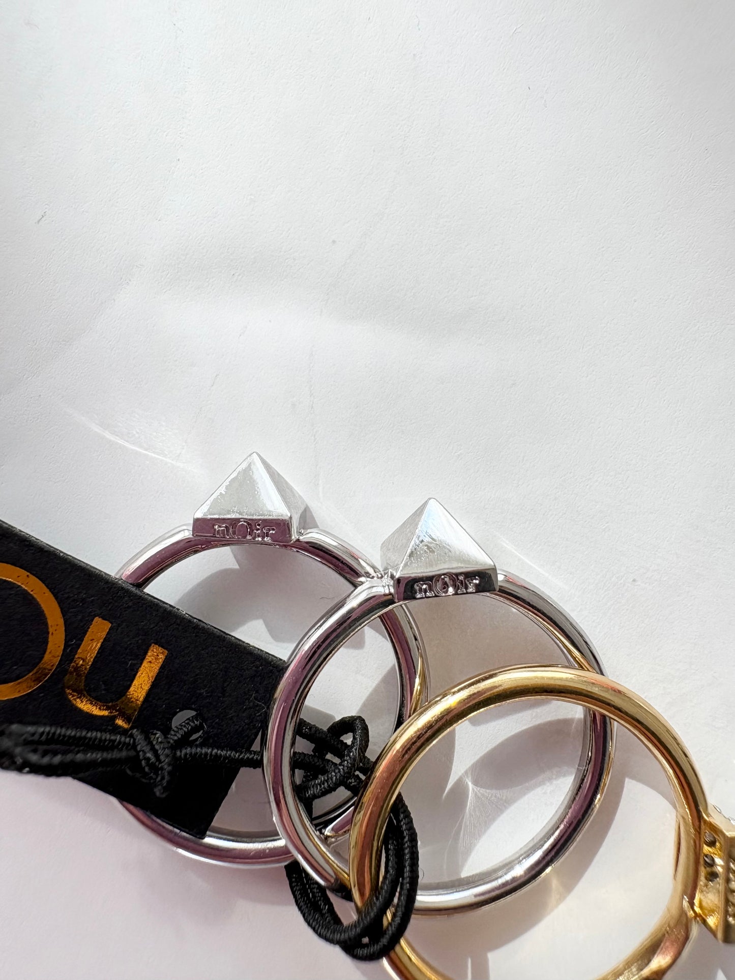 Noir NYC gold & silver pyramid ring stack