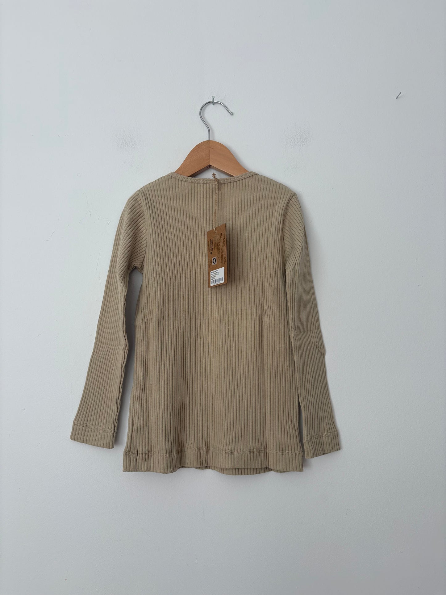 The simple folk ribbed top in ecru 7/8Y