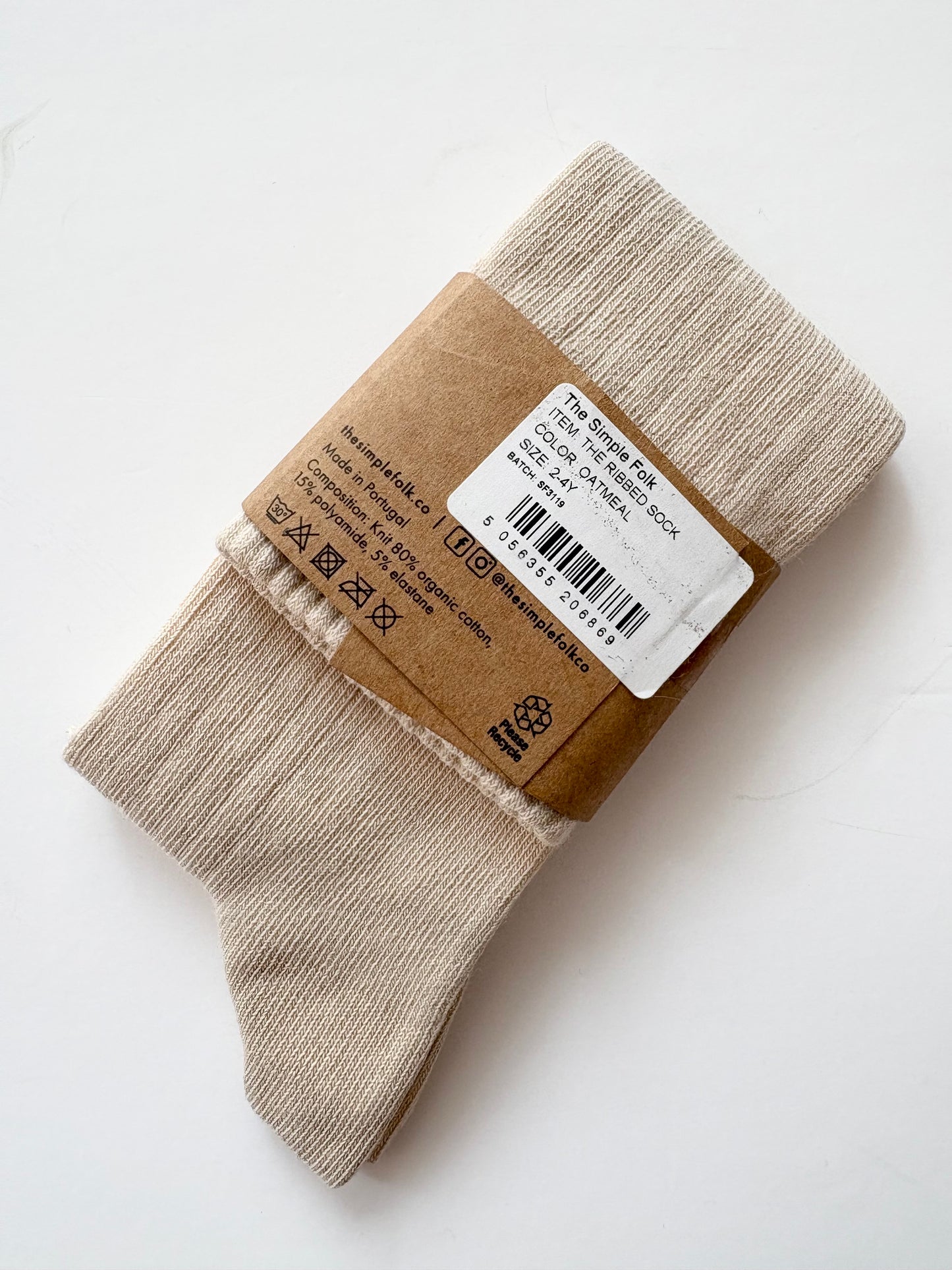 The simple folk ribbed socks in oatmeal 2-4Y