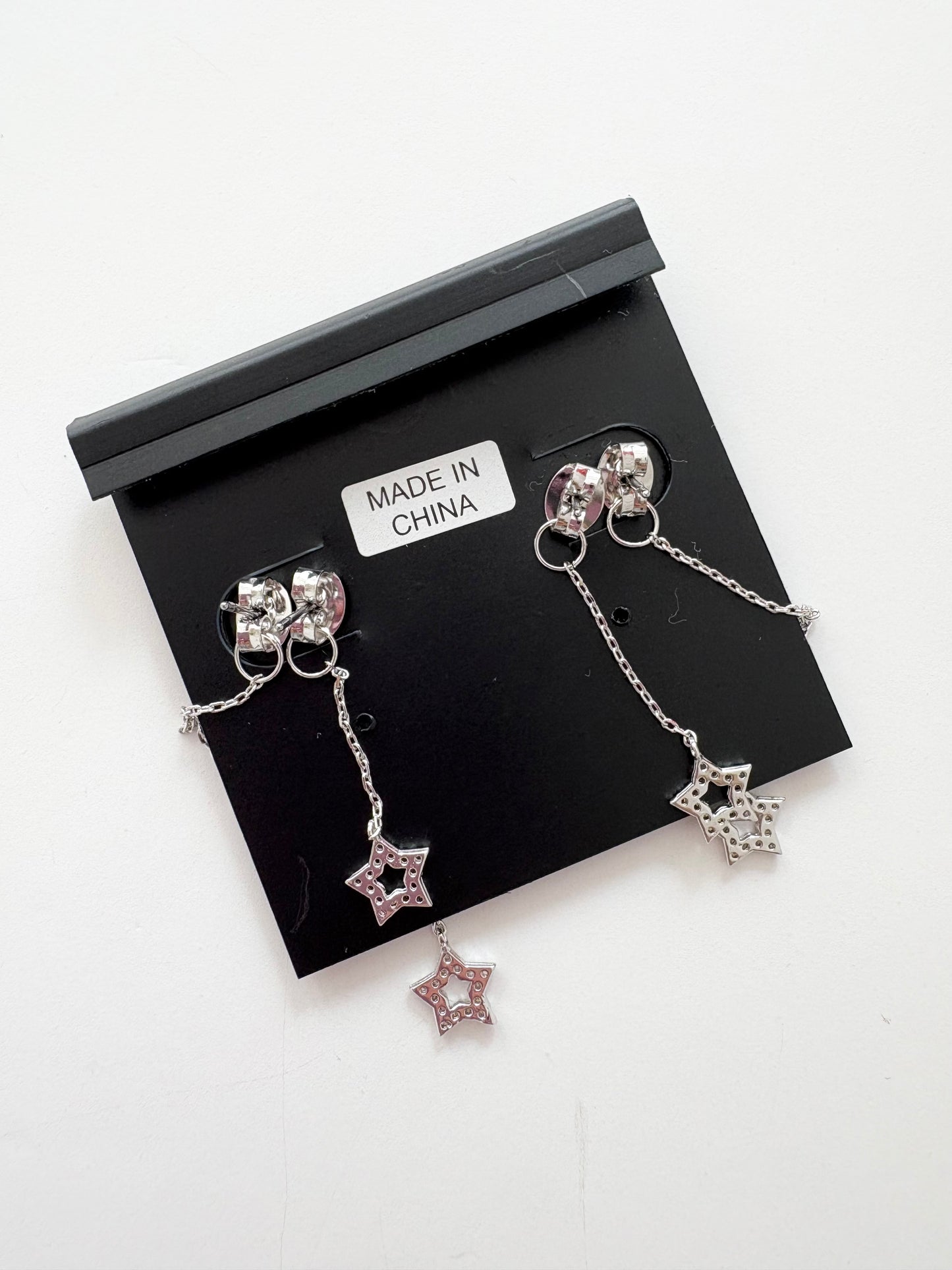 Noir NYC star swinger double earrings