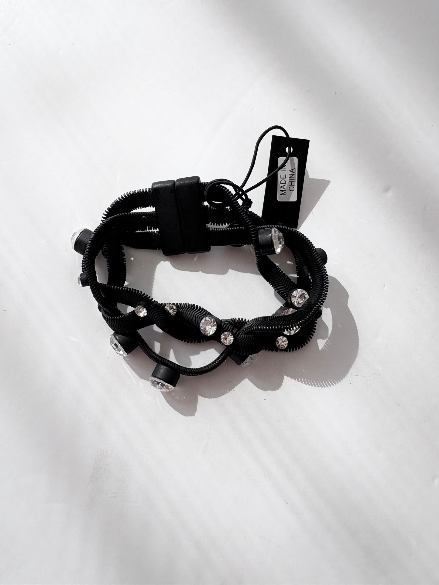 Noir NYC braided metal bracelet
