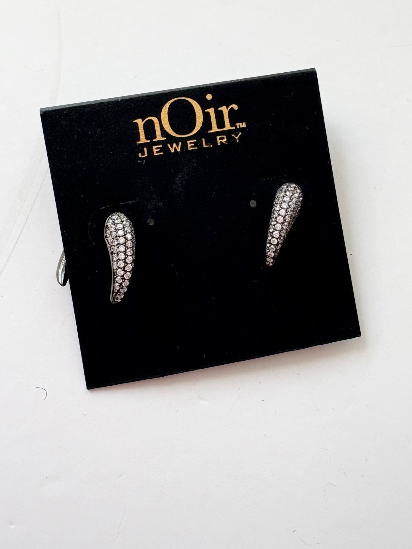 Noir NYC pavé gunmetal horn earrings
