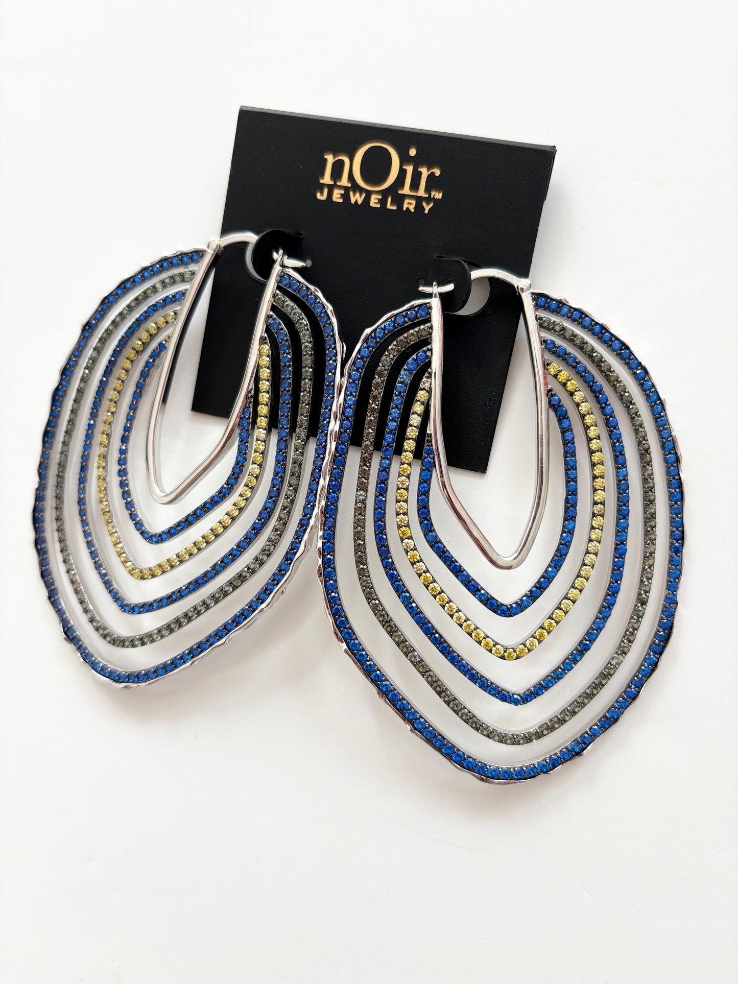 Noir NYC sunrise asymmetric hoops