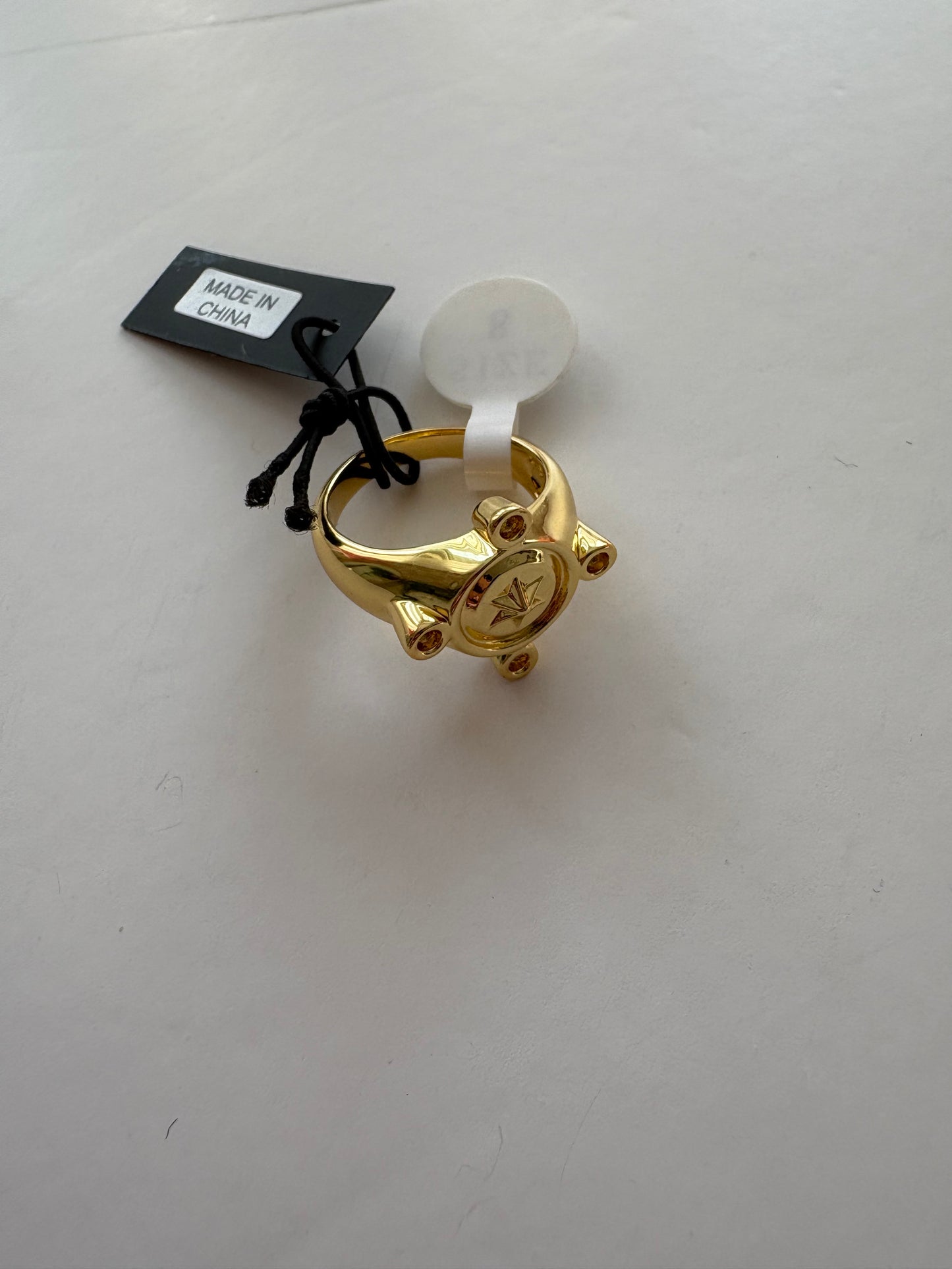 Noir NYC gold plated compass ring
