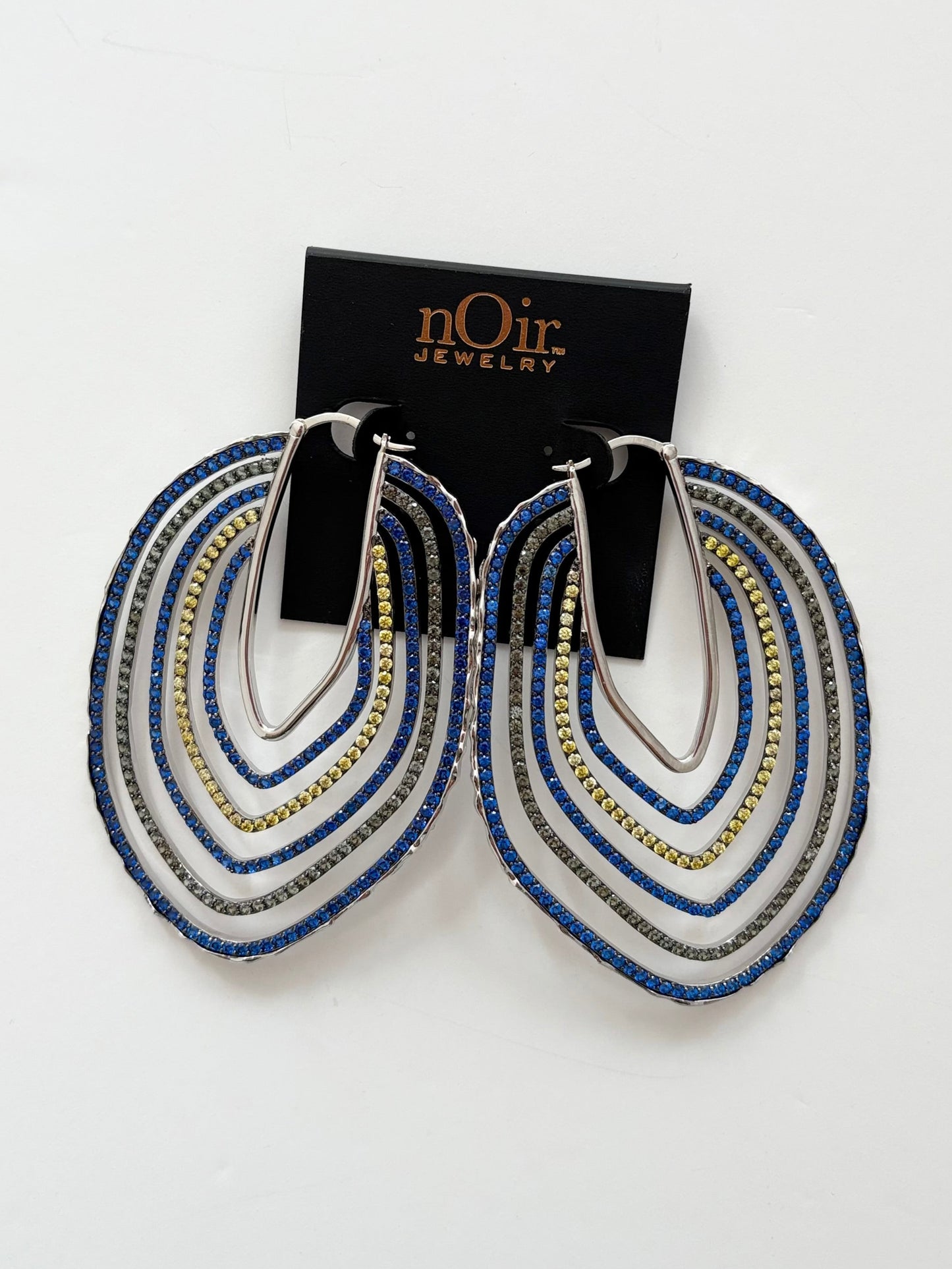 Noir NYC sunrise asymmetric hoops