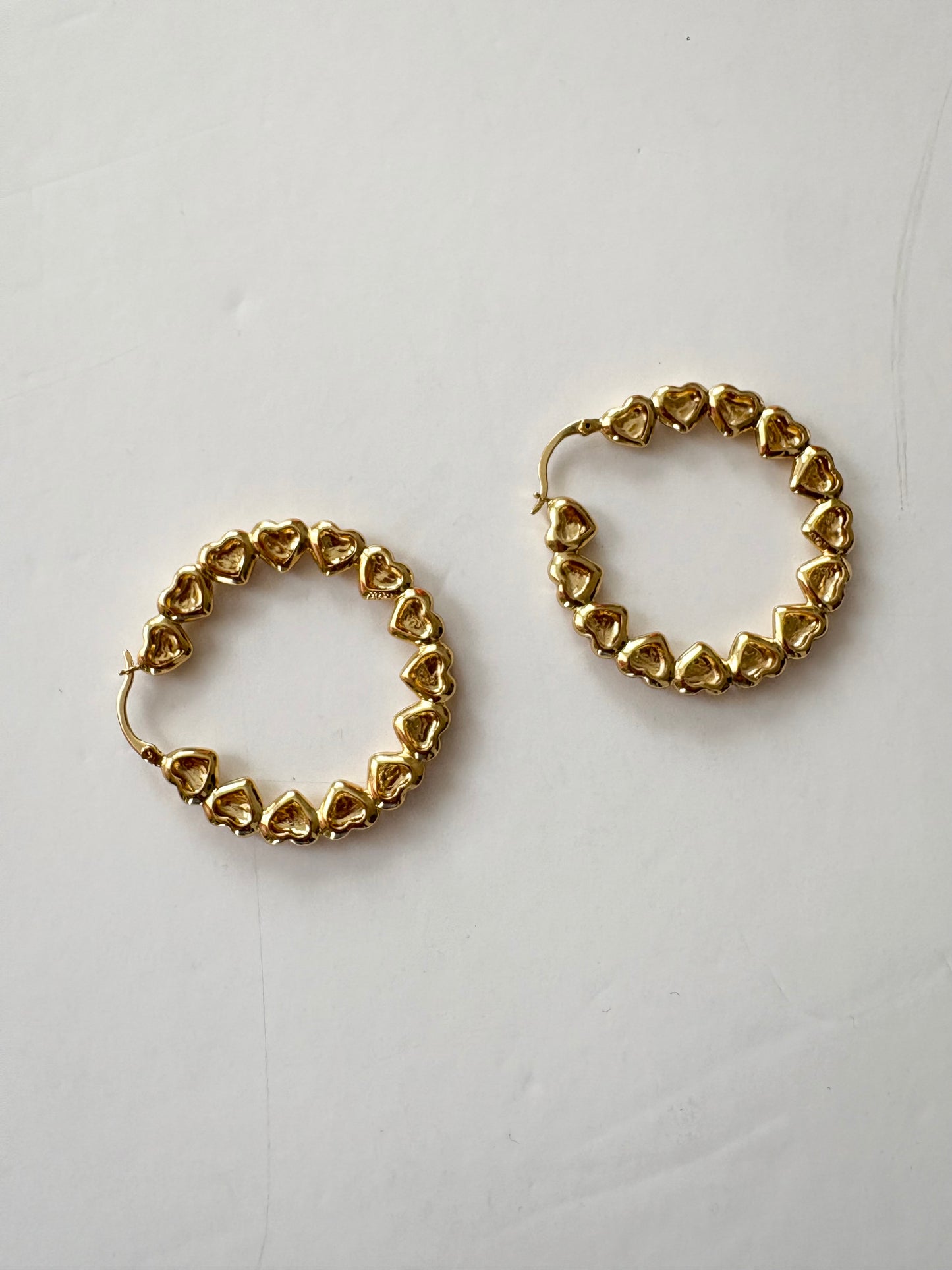 Noir NYC gold plated heart hoops
