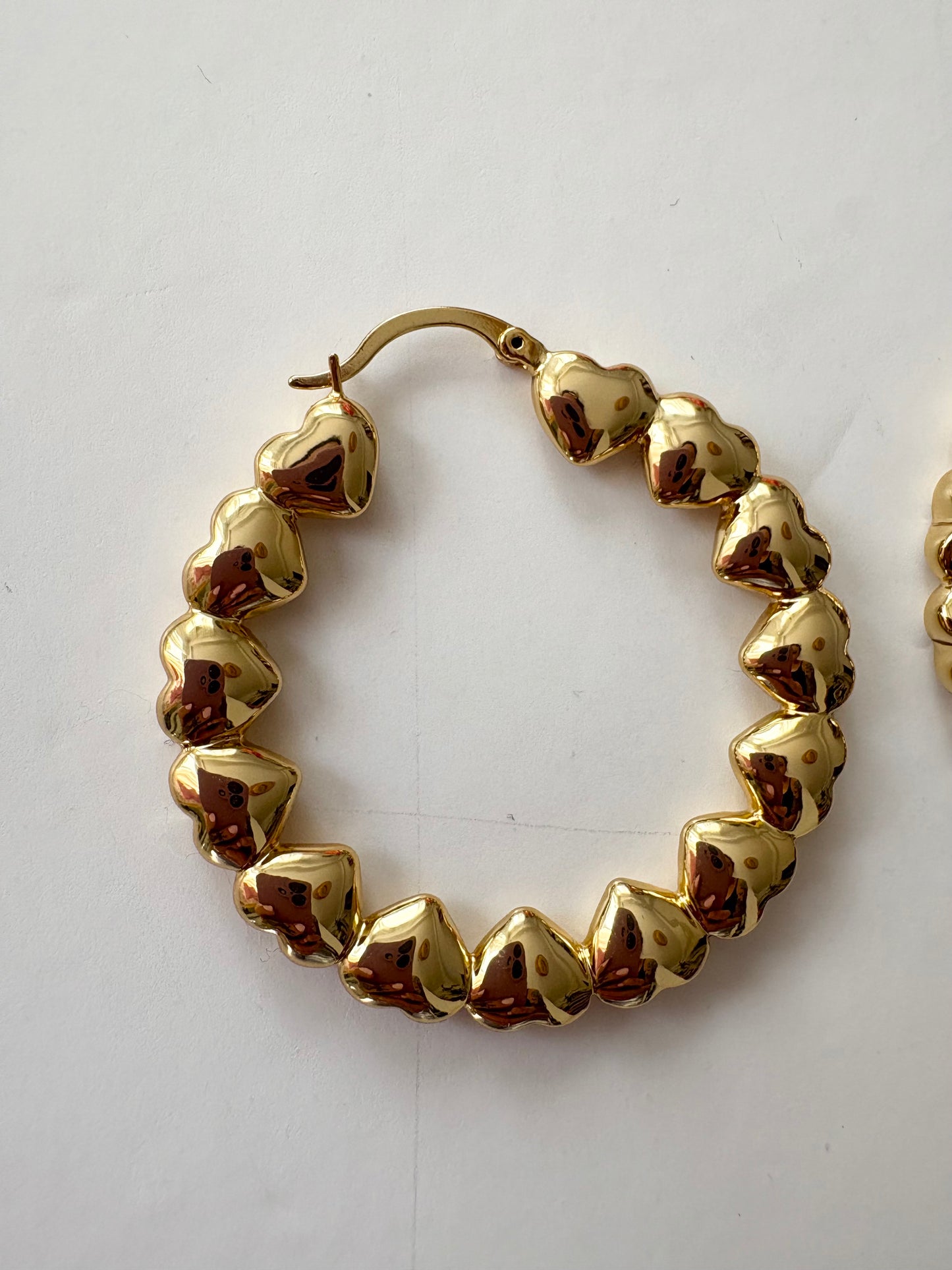 Noir NYC gold plated heart hoops