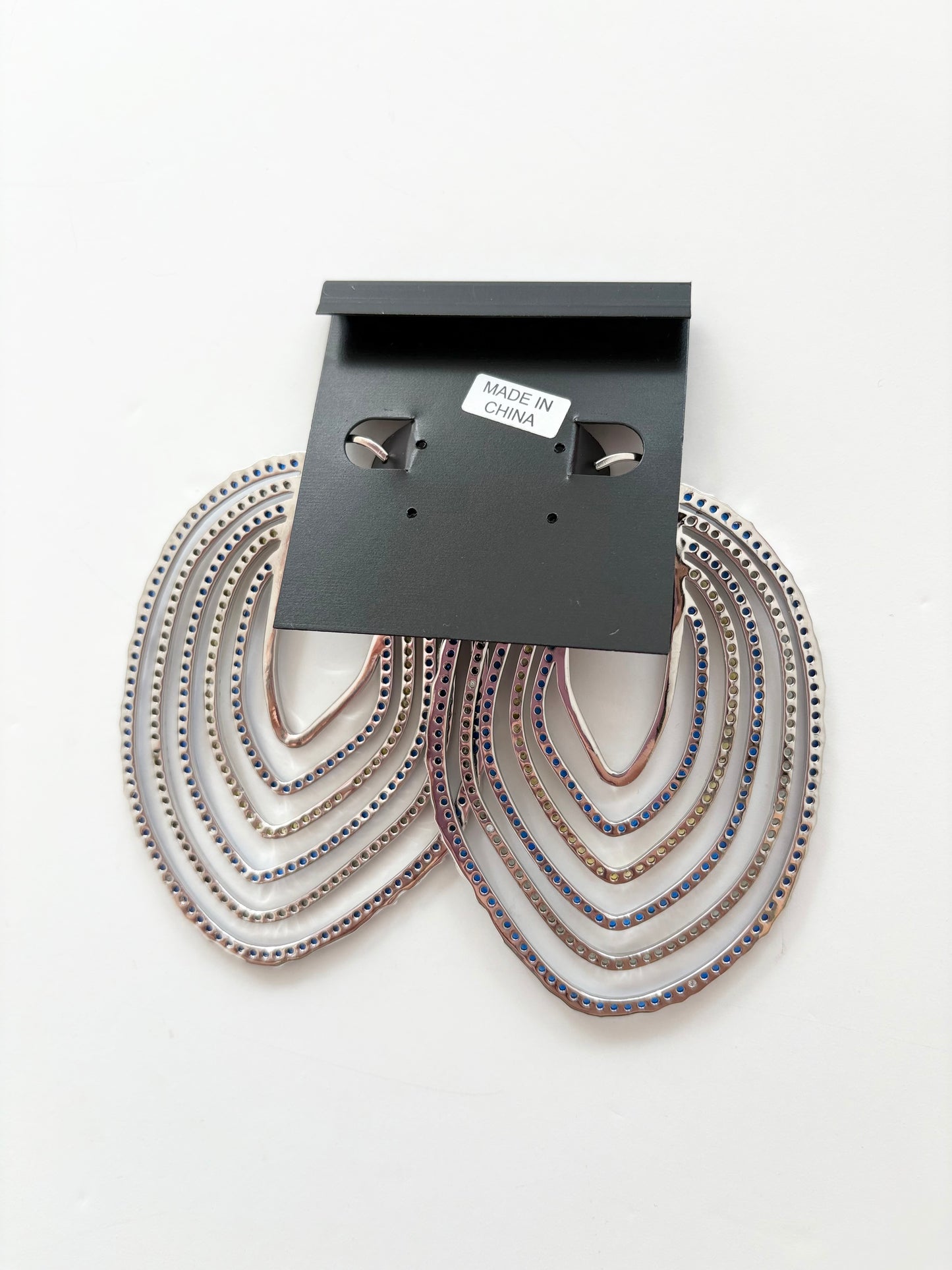 Noir NYC sunrise asymmetric hoops