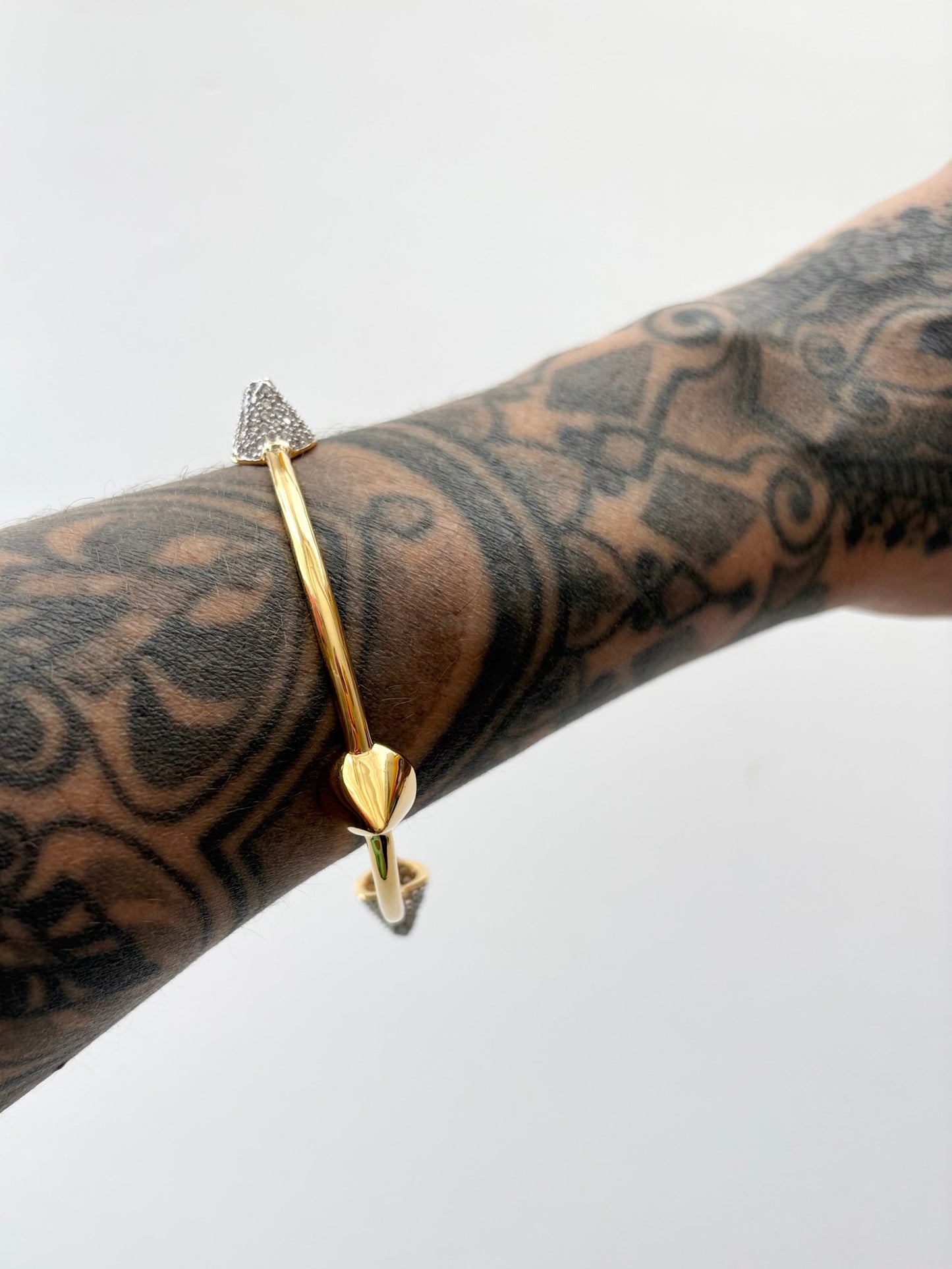 Noir NYC gold pave pyramid bracelet