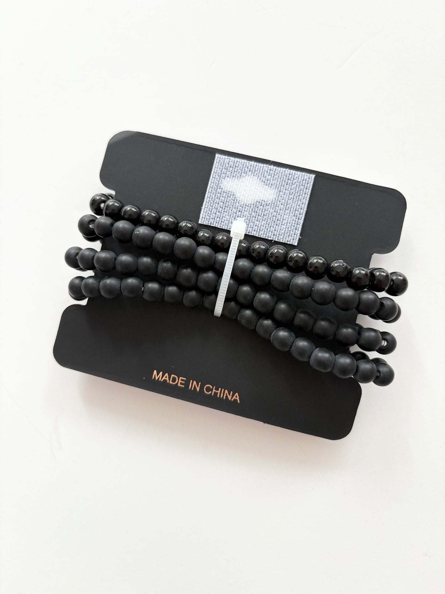 Noir NYC beaded bracelet stack
