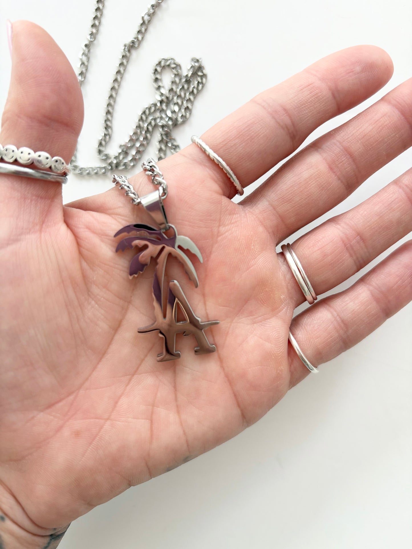 Noir NYC <A> palm tree pendant necklace