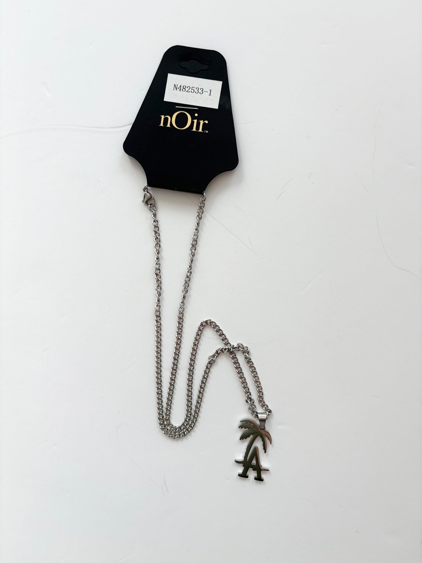 Noir NYC <A> palm tree pendant necklace