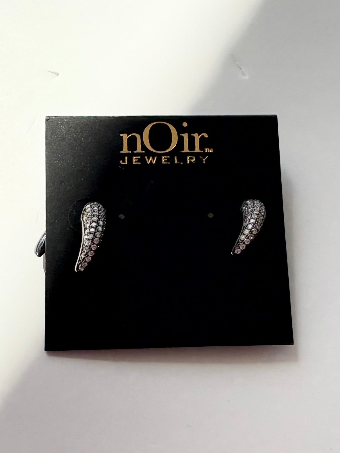 Noir NYC pavé gunmetal horn earrings