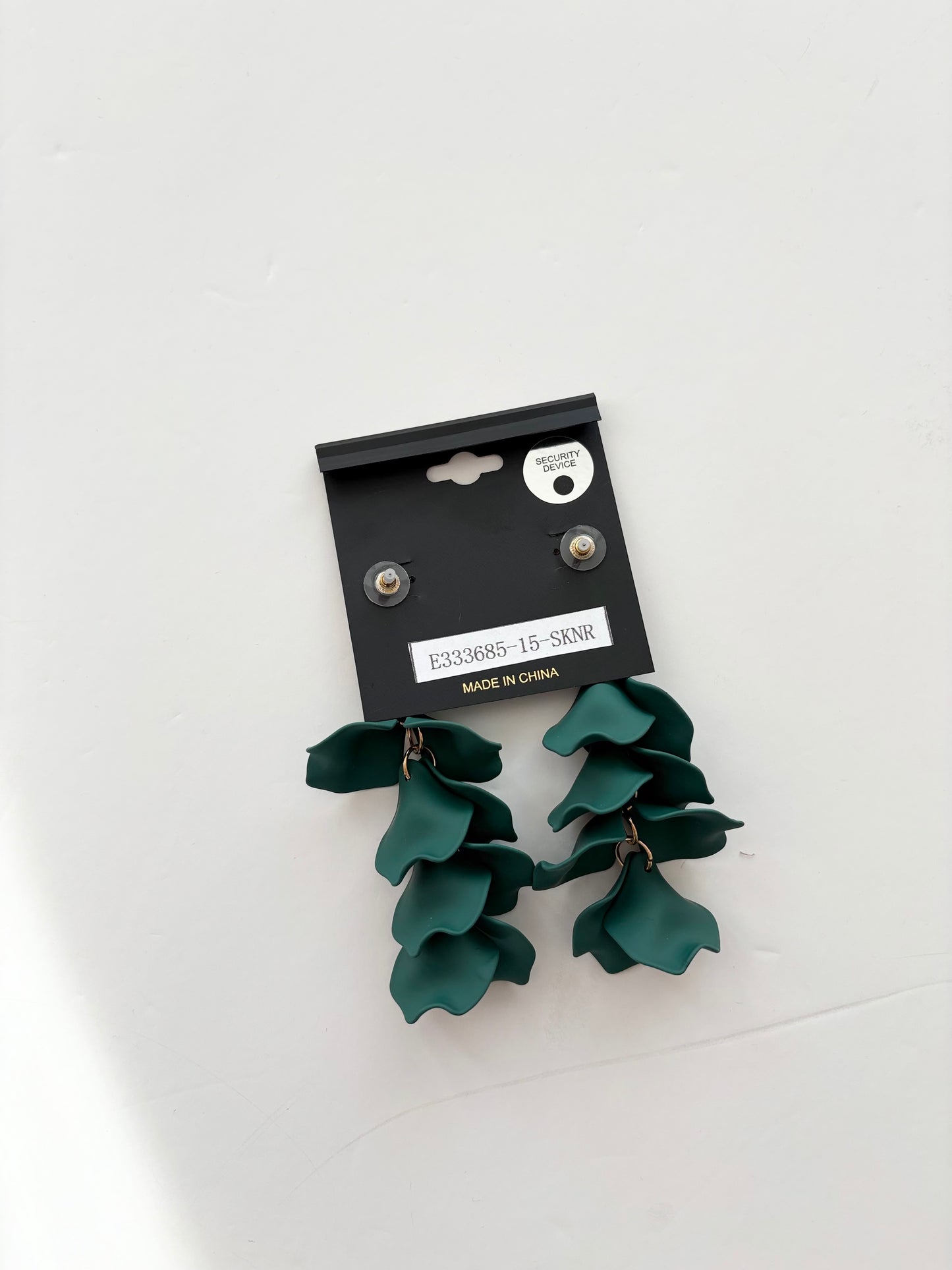 Noir NYC wavy floral pendant earrings