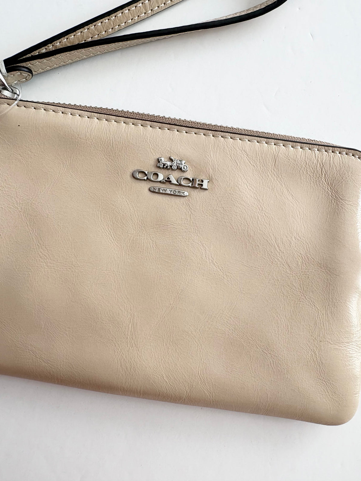Portefeuille a poignet et zip Coach