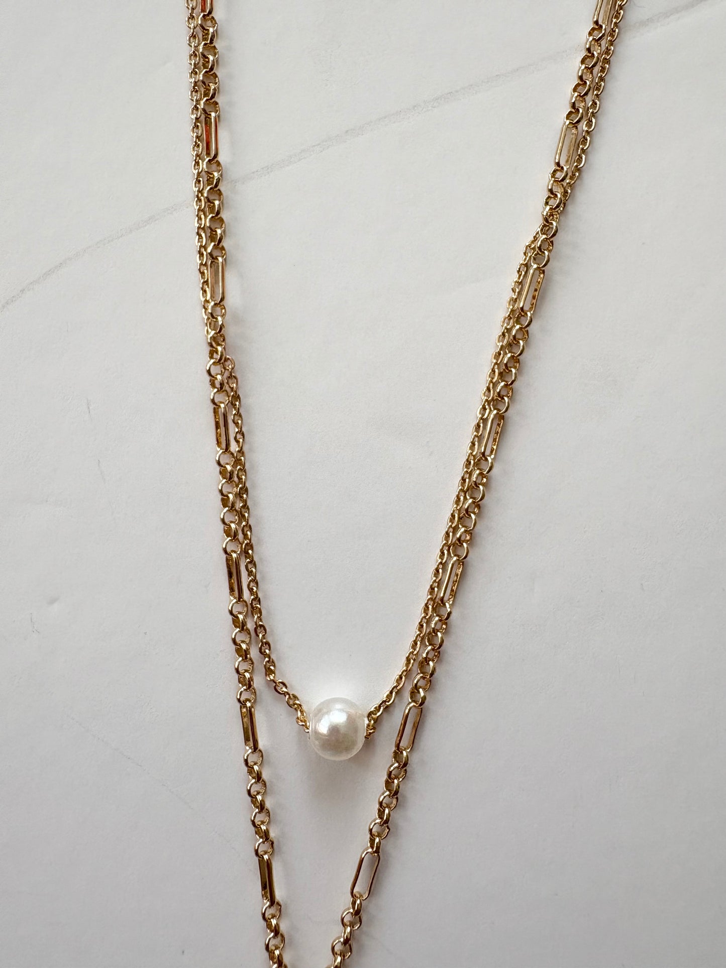 Noir NYC pacific sun charm pendant necklace