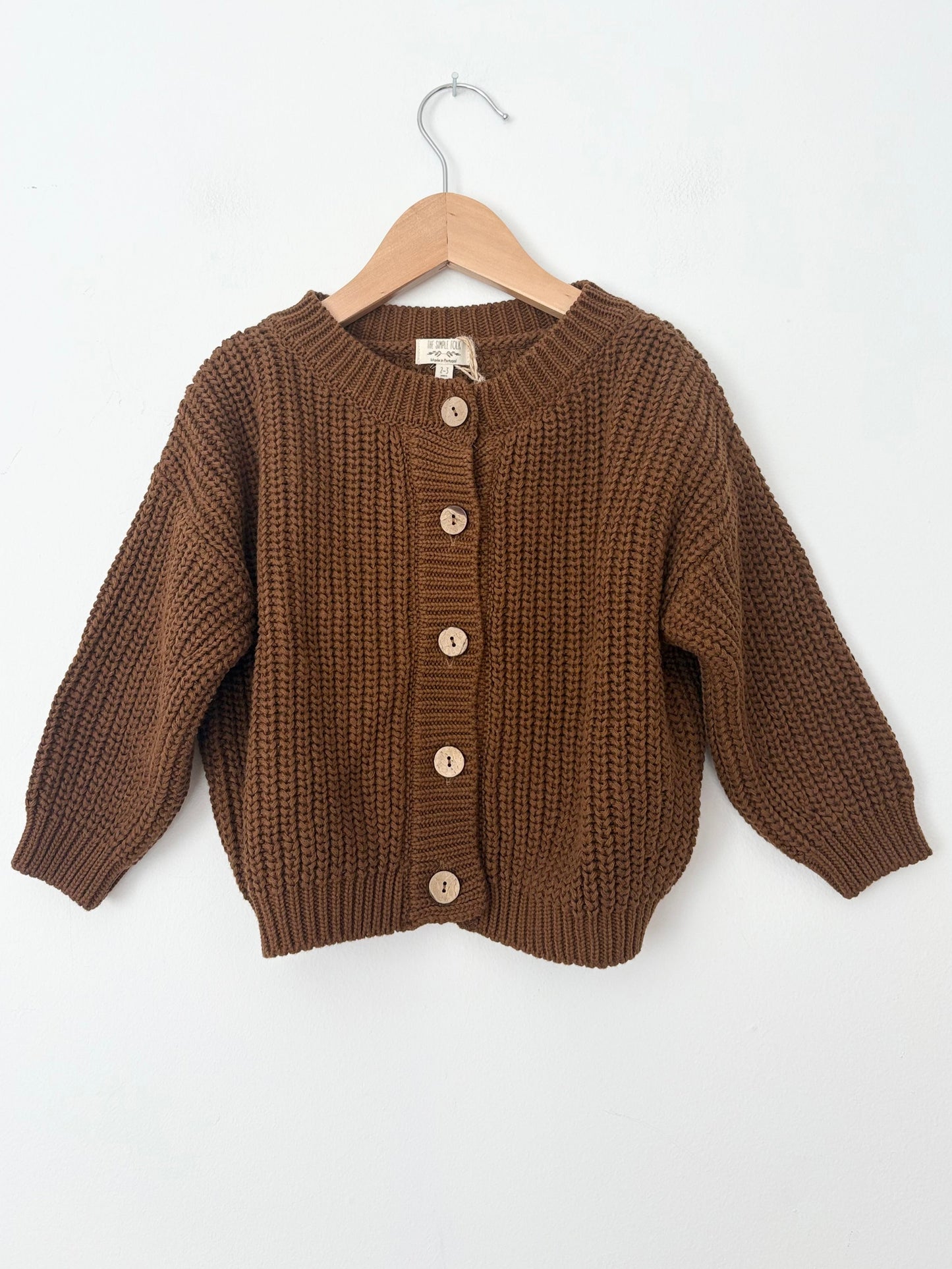 The simple folk chunky cardigan in rust 2/3Y