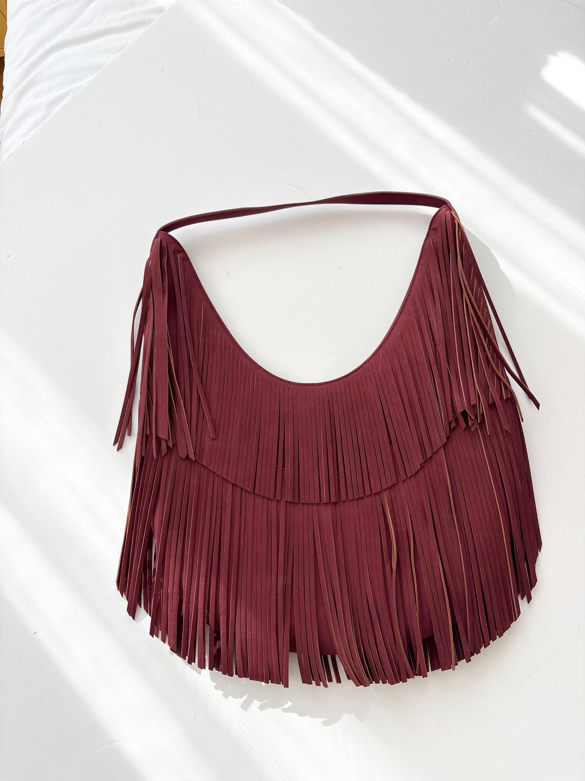 8 other reasons fringe oversized fringe bag
