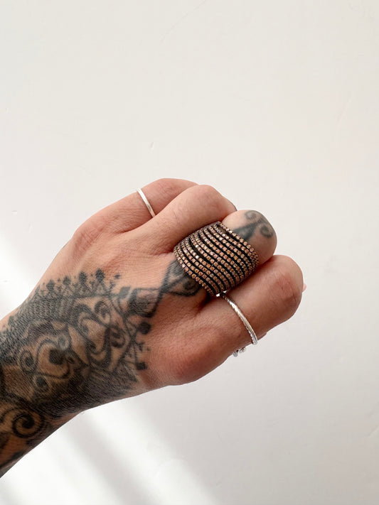 Noir NYC gunmetal spiral crystal ring
