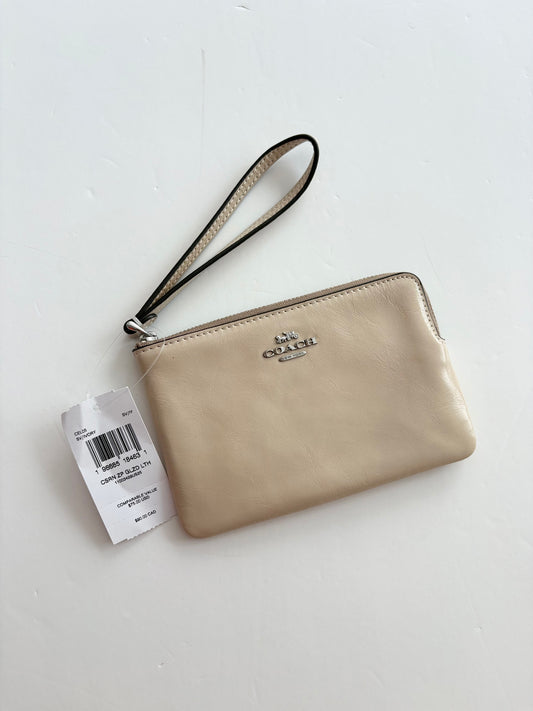 Portefeuille a poignet et zip Coach