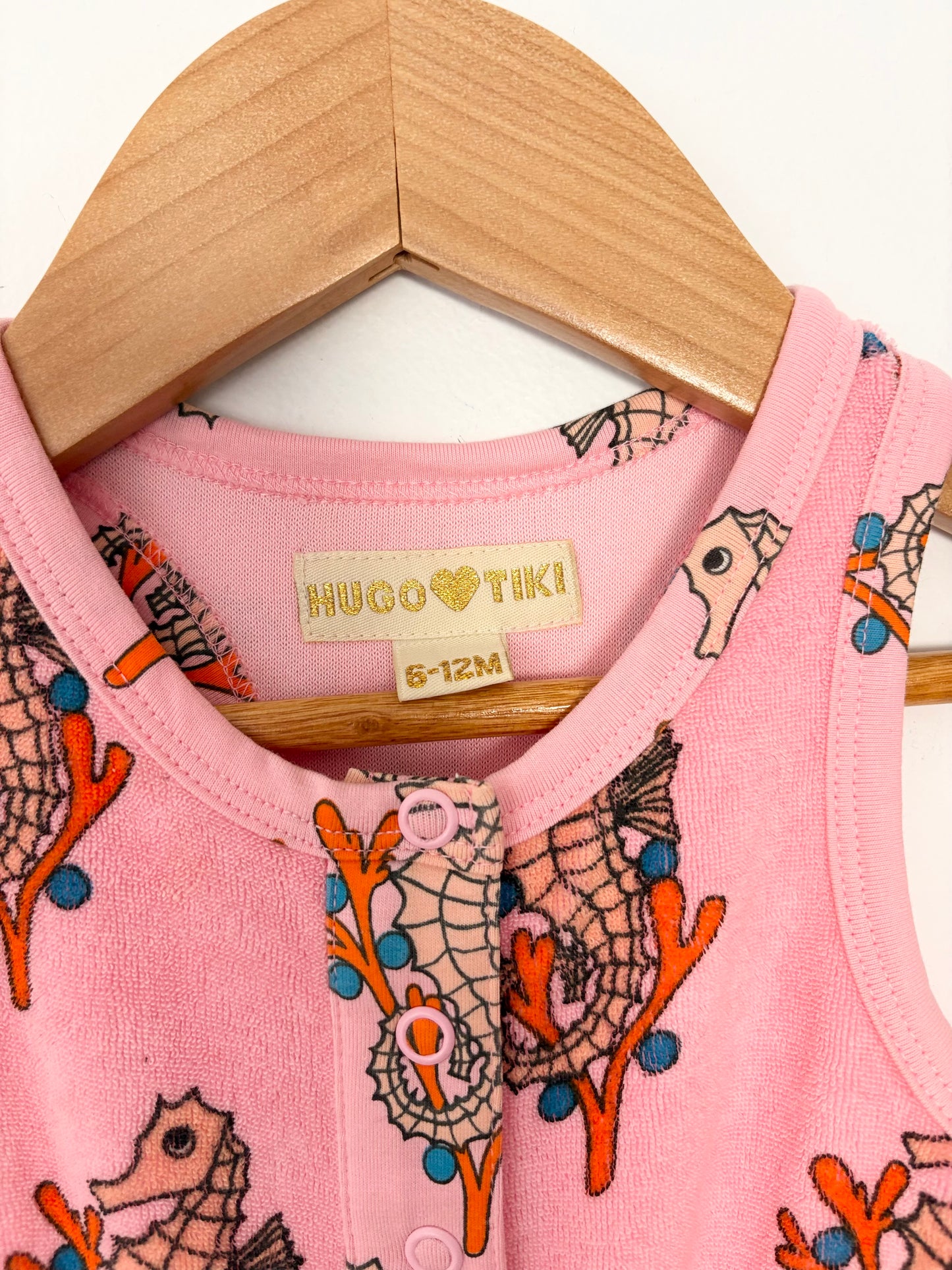 Hugo loves tiki toweling romper 6-12 months
