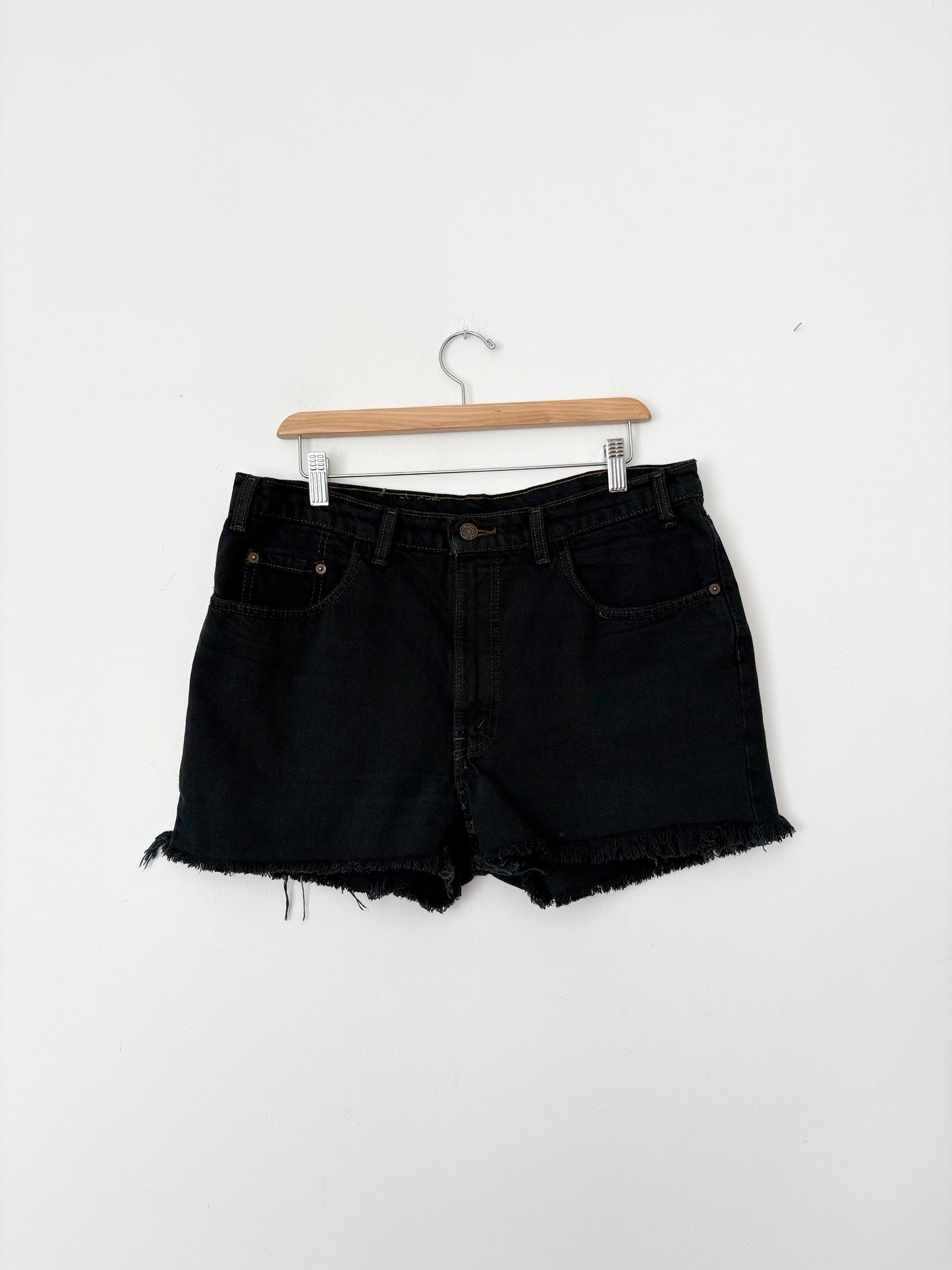 Short en jean Levi's vert foncé vintage, coupé, taille 32/33