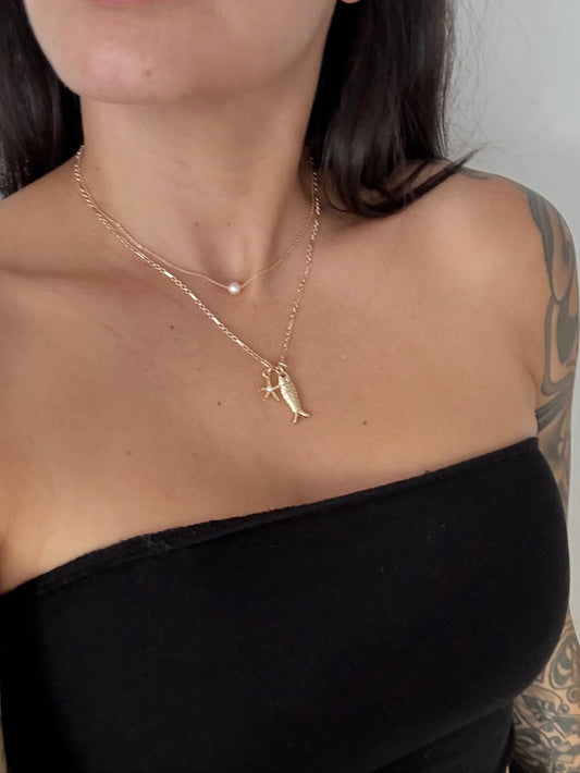 Noir NYC pacific sun charm pendant necklace
