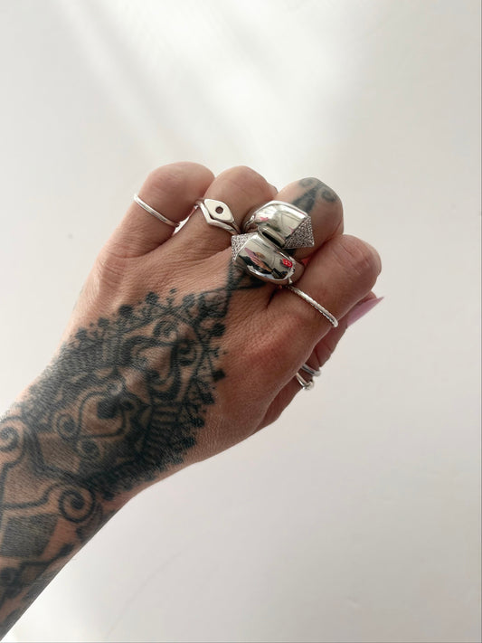 Noir NYC twisted pyramid ring