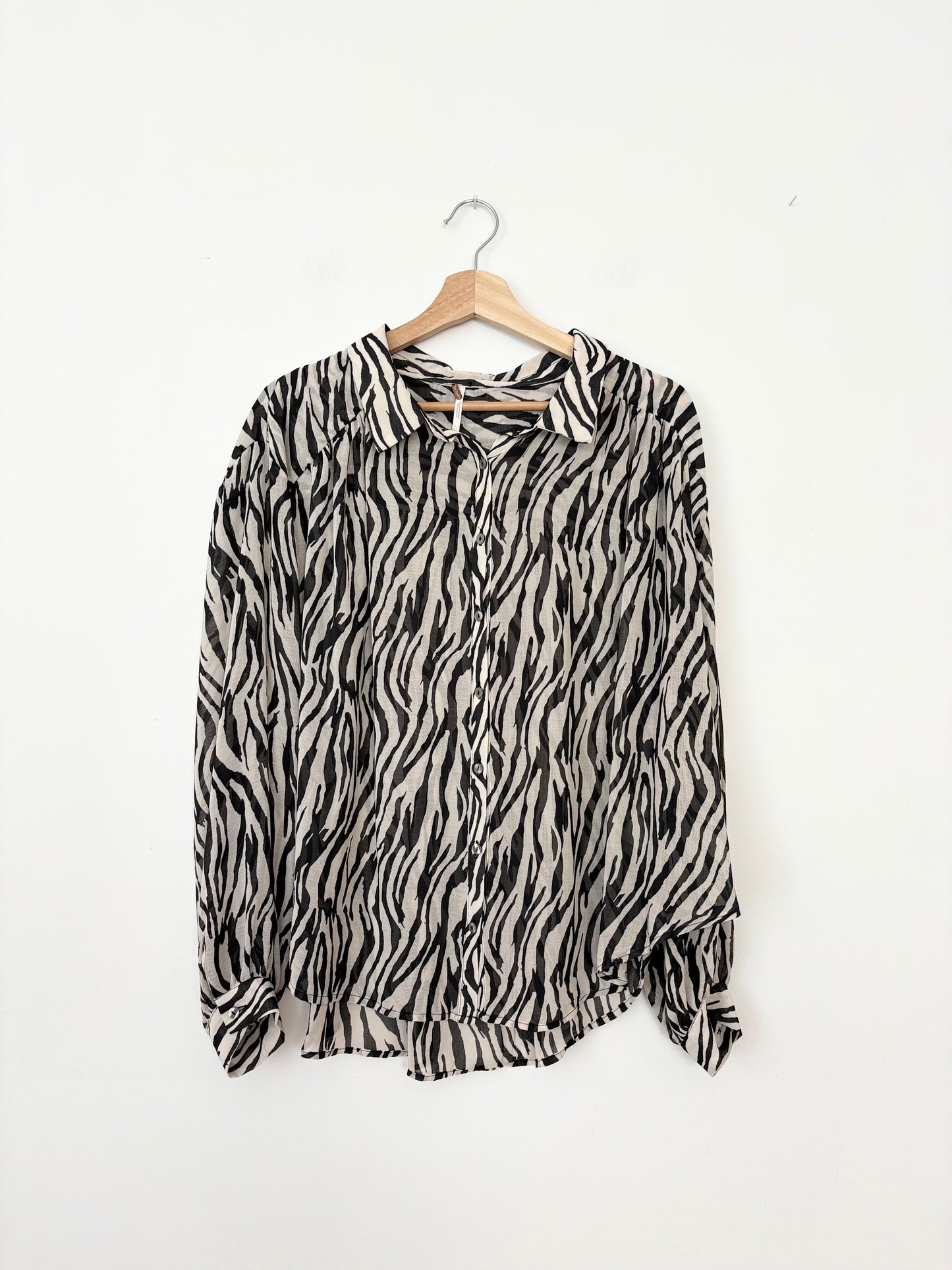 Free People ciara zebra button down shirt M/L