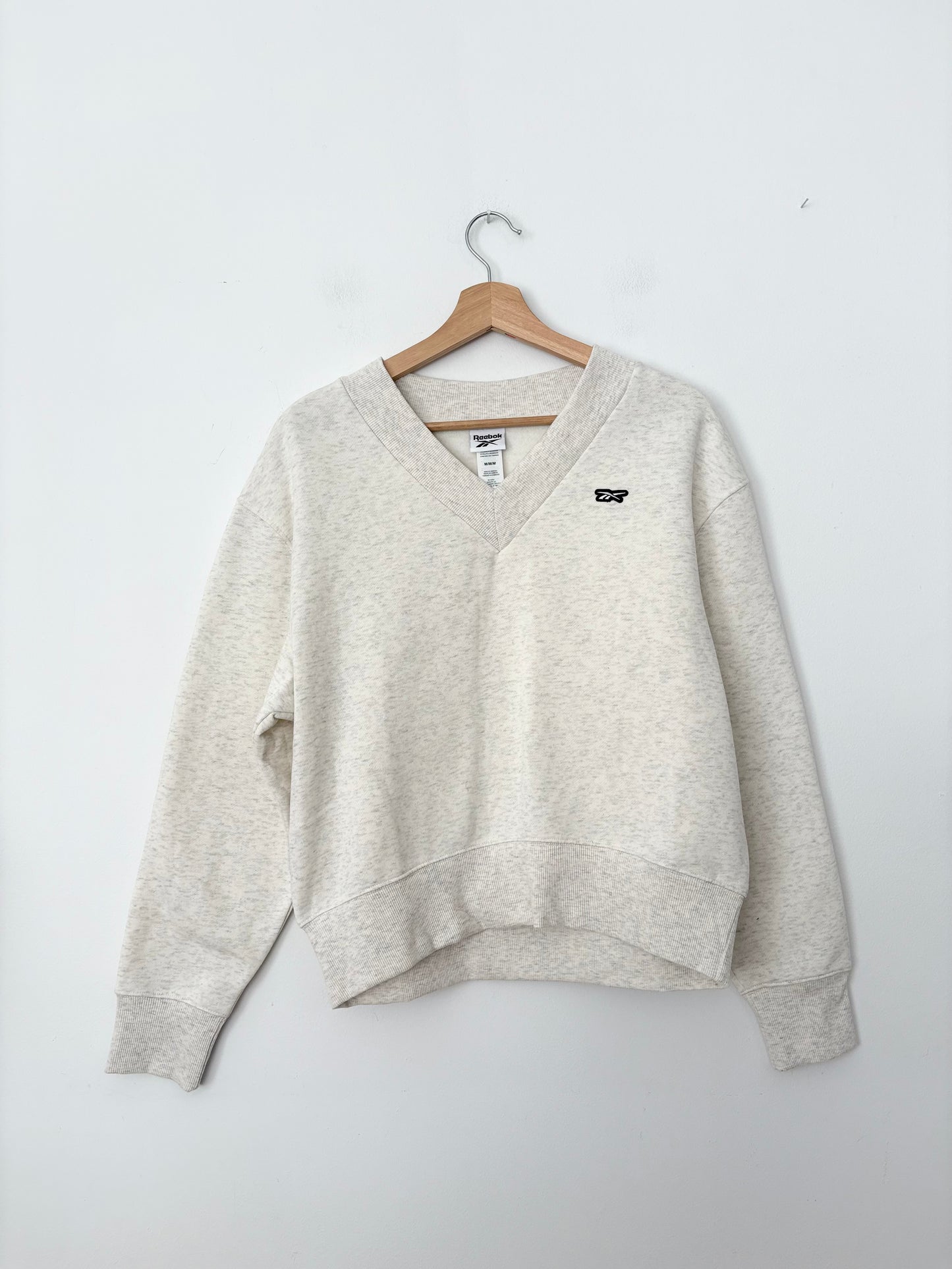 Reebok V neck sweatshirt M/L